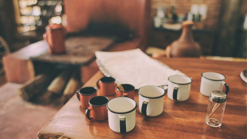 Forex trader managing risk on multiple screens